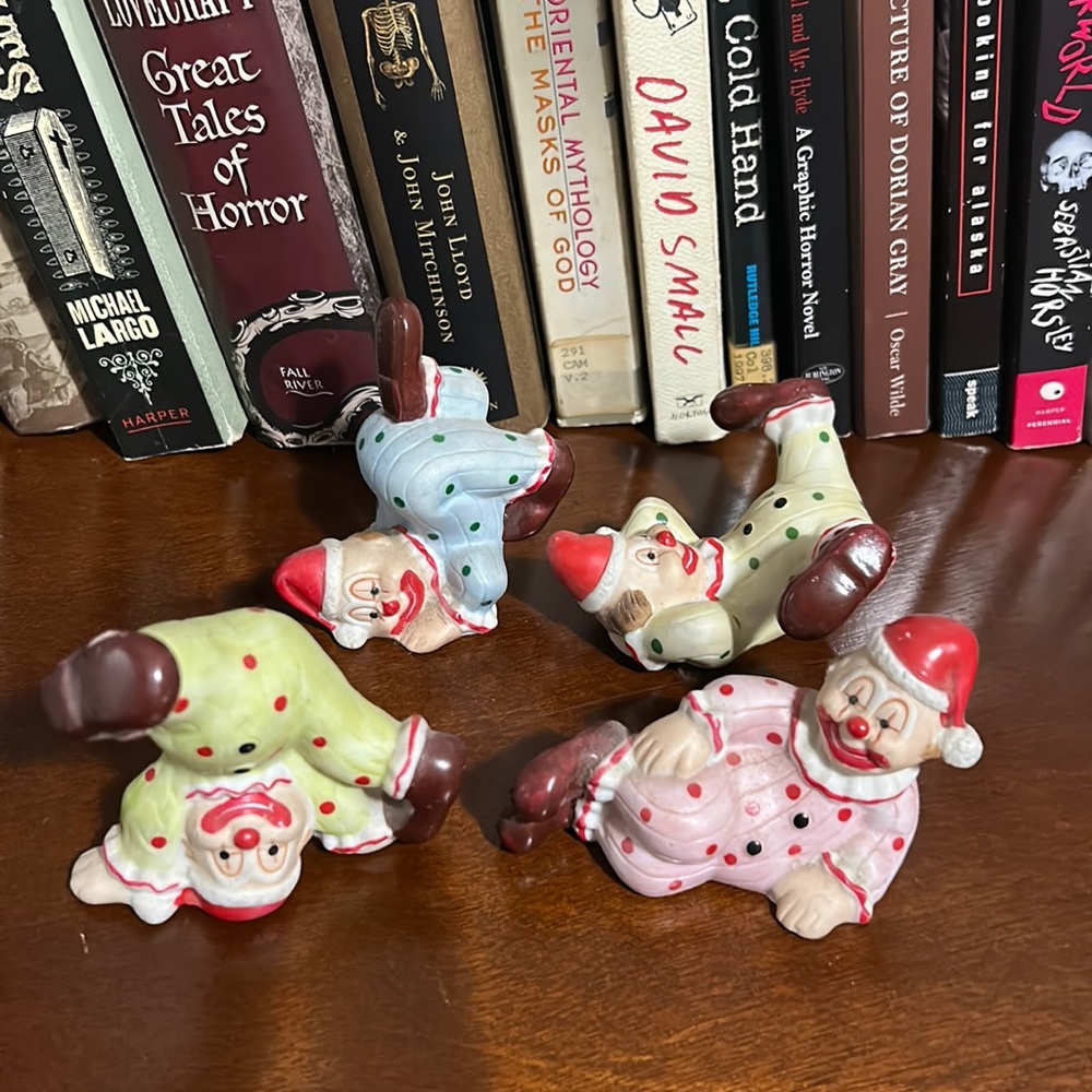Set of 4 porcelain clowns
